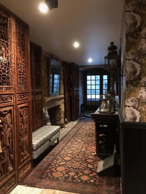 Postel nebo postele na pokoji v ubytování B&B du Cloître