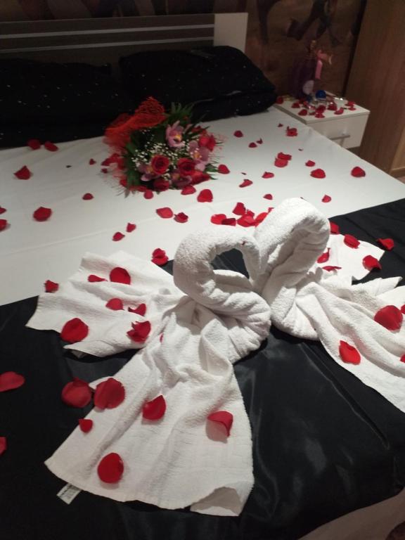 Postel nebo postele na pokoji v ubytování Hotel Hobby