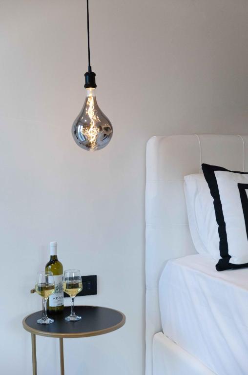 Łóżko lub łóżka w pokoju w obiekcie Porta Reale Suite by CorfuEscapes