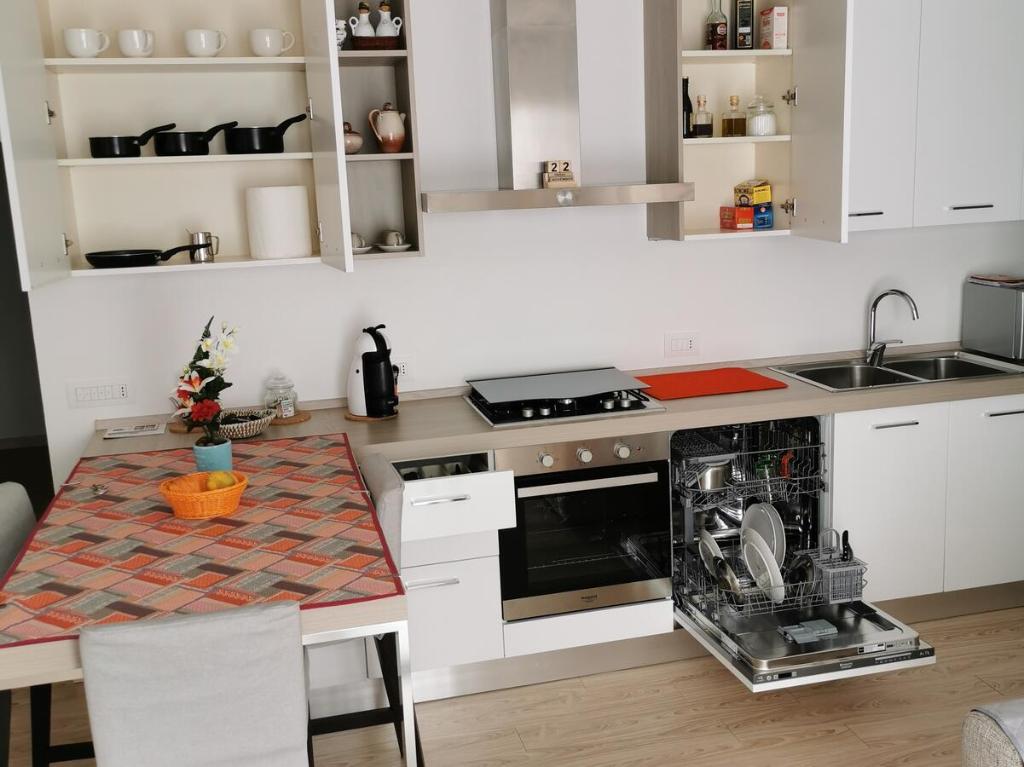 Kuchyň nebo kuchyňský kout v ubytování Residenza Le Torri