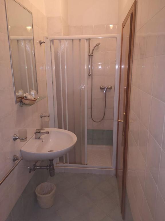 Koupelna v ubytování Hotel Manola