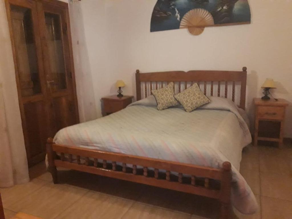 Postel nebo postele na pokoji v ubytování Apart Hotel Dolce Vita