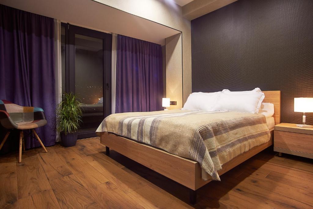 Postel nebo postele na pokoji v ubytování Green Boutique Hotel