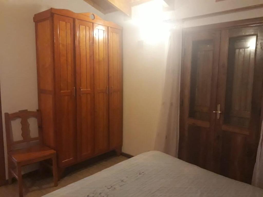 Postel nebo postele na pokoji v ubytování Apart Hotel Dolce Vita