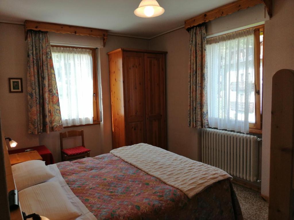 Letto o letti in una camera di Hotel Zebrù
