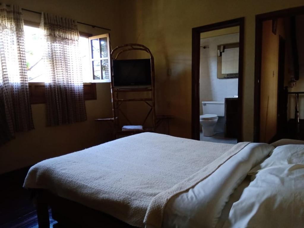 Postel nebo postele na pokoji v ubytování Hotel Campestre los Duraznos