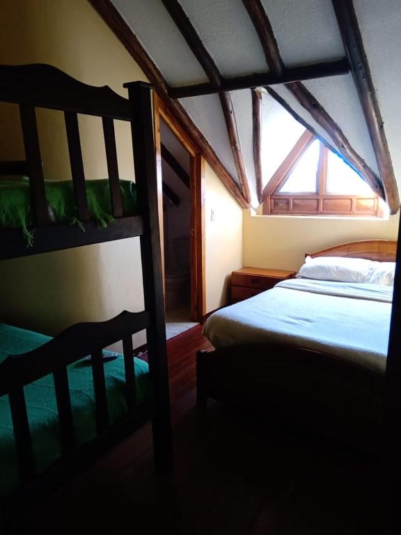Postel nebo postele na pokoji v ubytování Hotel Campestre los Duraznos