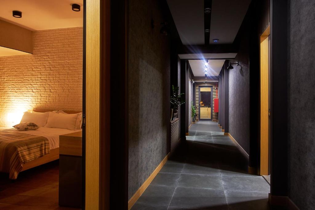 Postel nebo postele na pokoji v ubytování Green Boutique Hotel