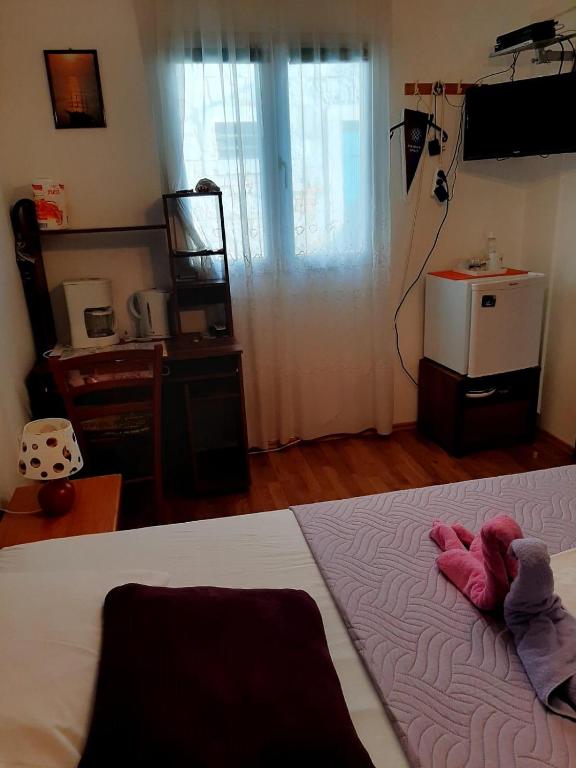 Postel nebo postele na pokoji v ubytování Rosmarinus Rubic studio