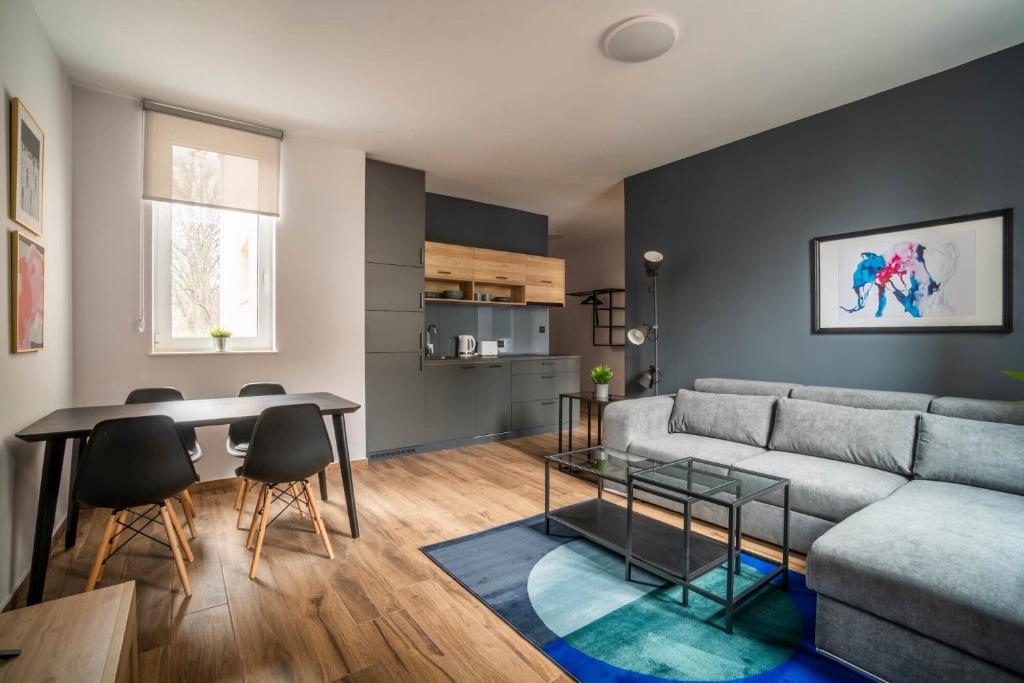 Kuchyň nebo kuchyňský kout v ubytování HostGost Selected Suites - Botanical Garden