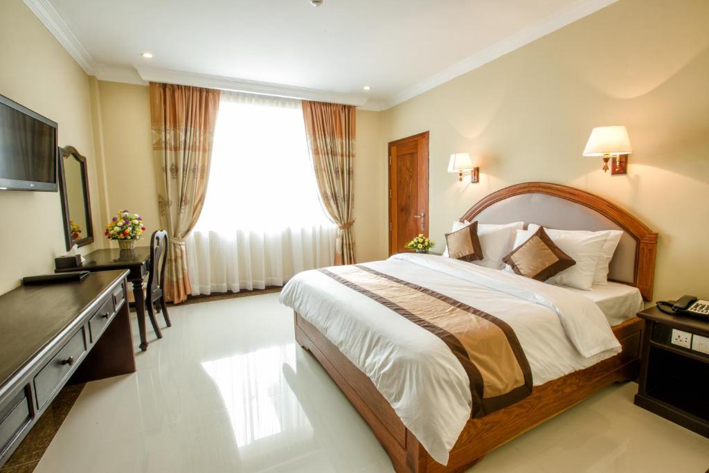 Postel nebo postele na pokoji v ubytování Classy Hotel & Spa