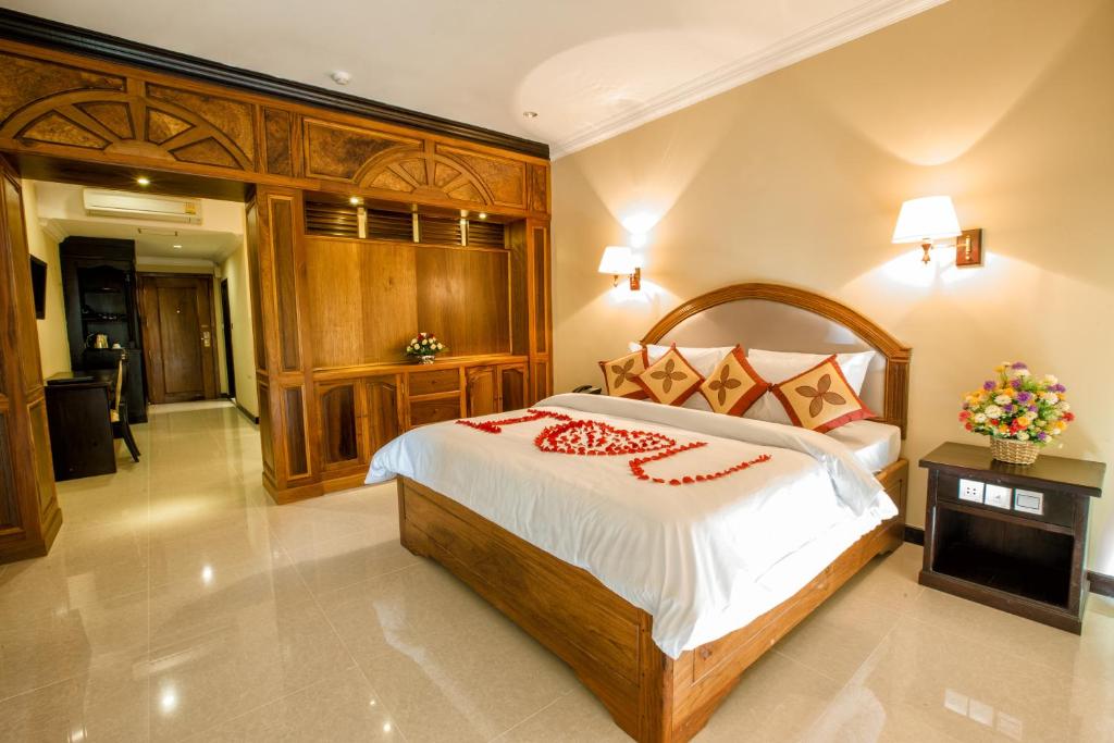 Postel nebo postele na pokoji v ubytování Classy Hotel & Spa