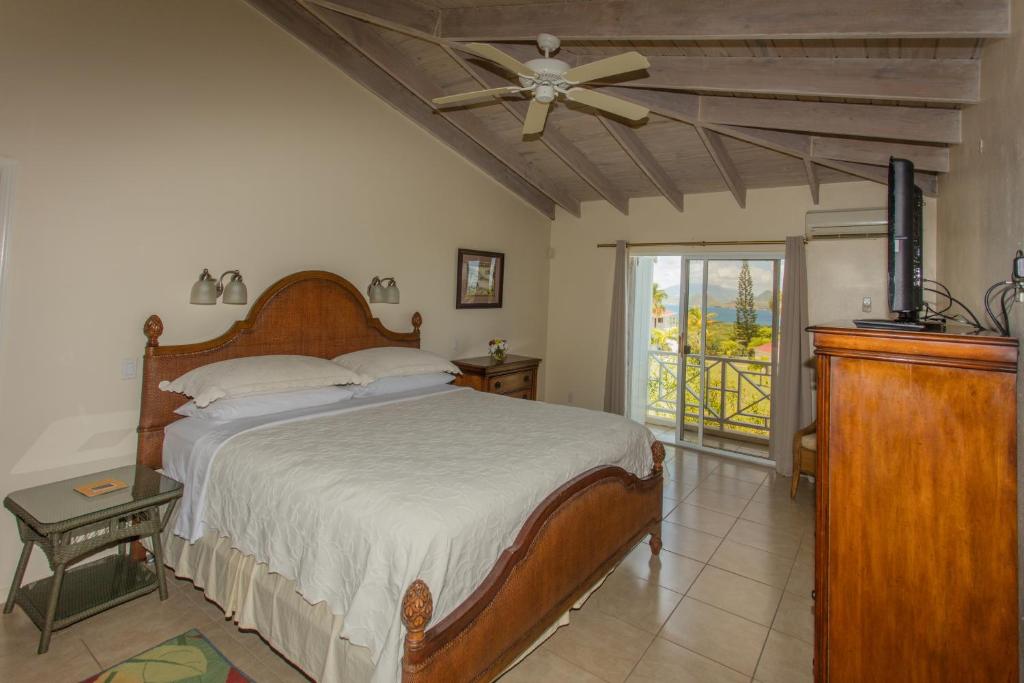 Postel nebo postele na pokoji v ubytování Mount Nevis Hotel