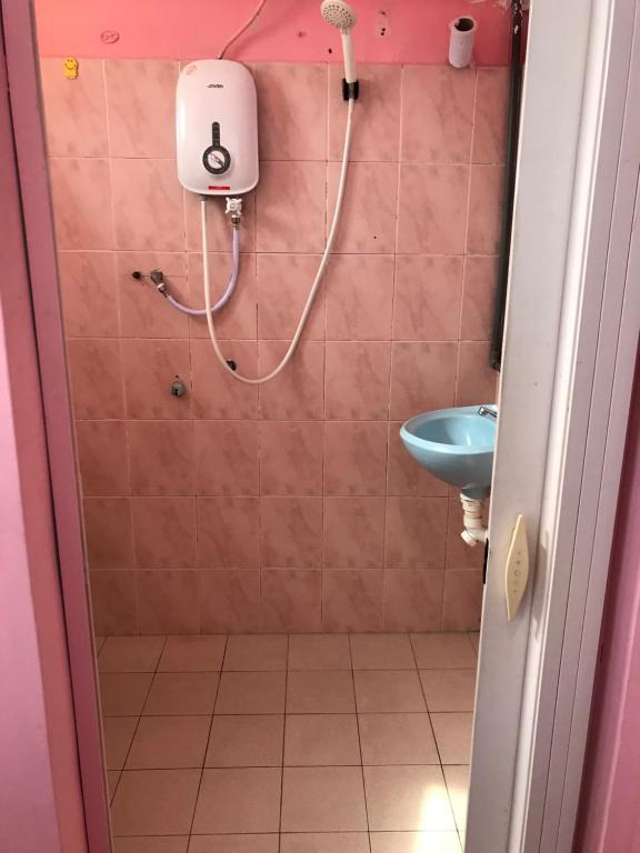 Koupelna v ubytování Hotel Cahaya