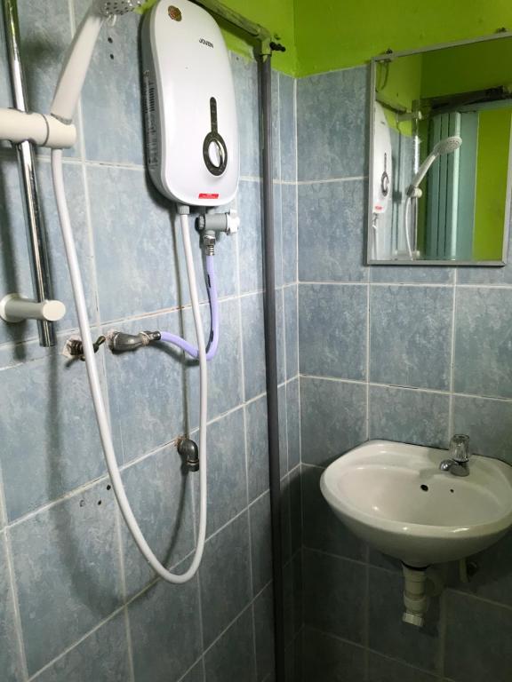 Koupelna v ubytování Hotel Cahaya