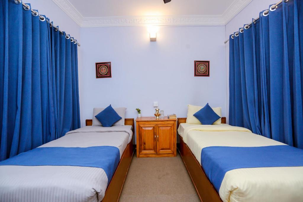 Krevet ili kreveti u jedinici u okviru objekta Gaurishankar Backpackers hostel