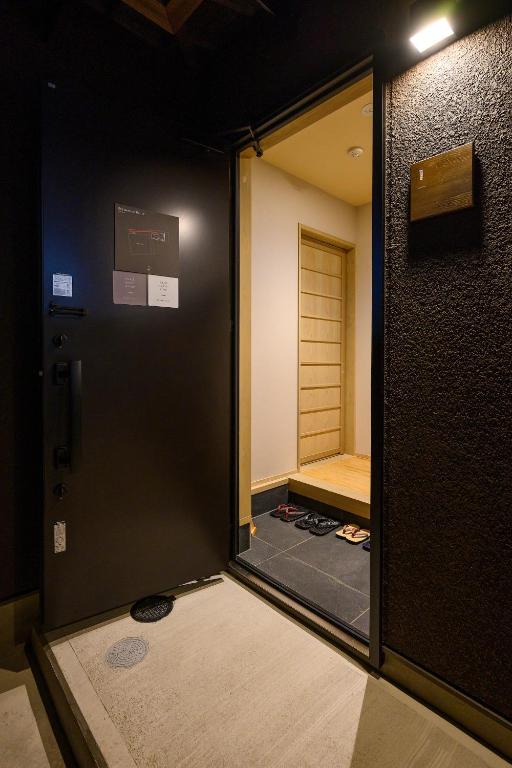 Postel nebo postele na pokoji v ubytování HOTEL WOOD TAKAYAMA