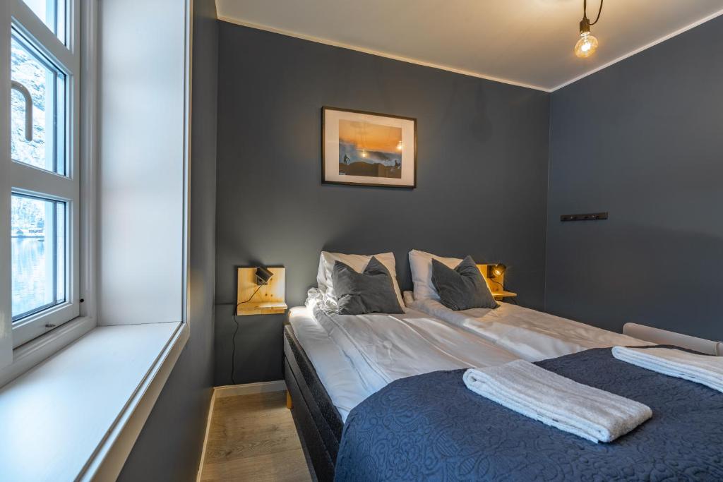 Postel nebo postele na pokoji v ubytování Lofoten Apartments
