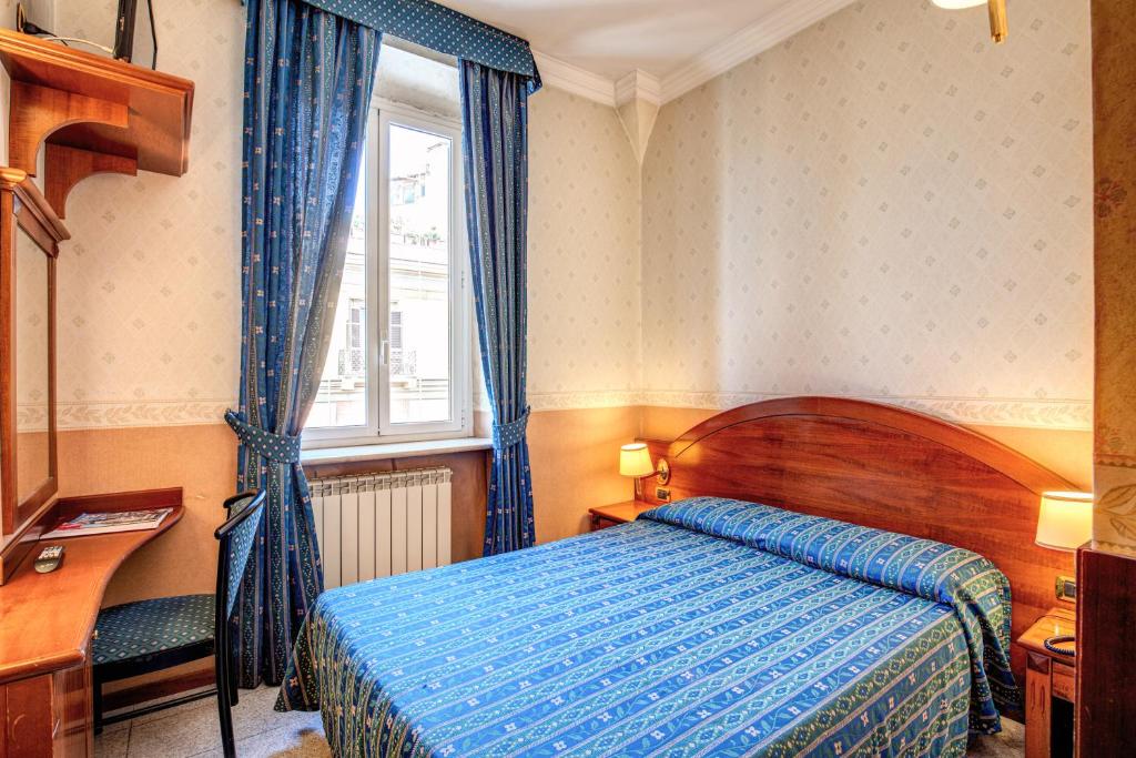 Posteľ alebo postele v izbe v ubytovaní Hotel Verona Rome
