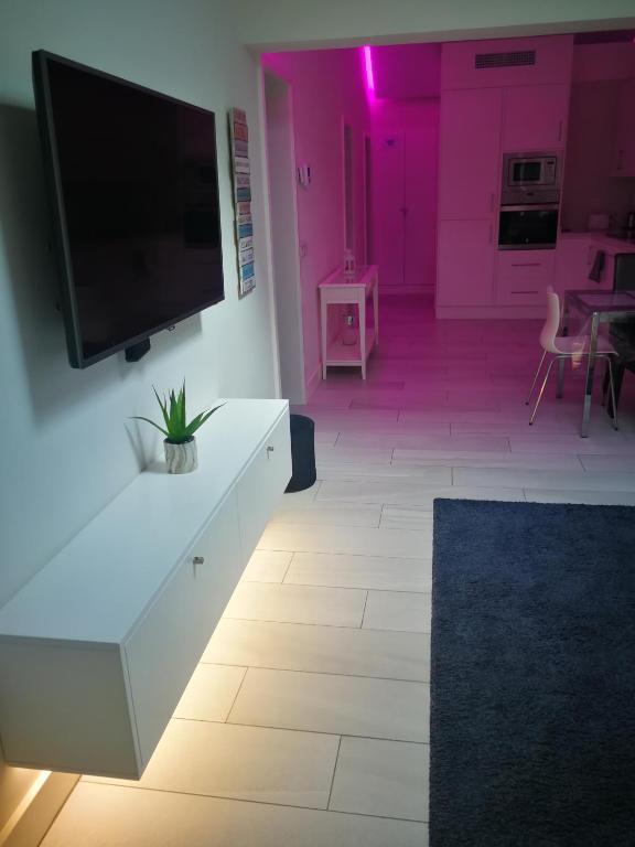Telewizja i/lub zestaw kina domowego w obiekcie Cozy Luxury