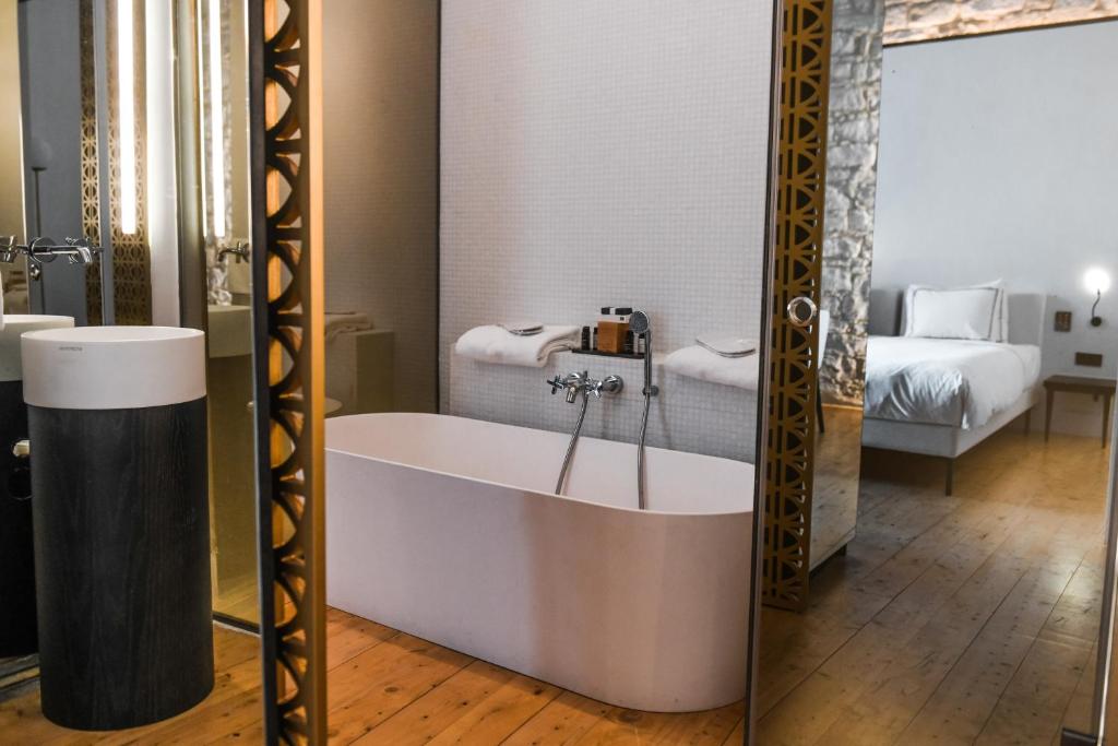 Postel nebo postele na pokoji v ubytování S Paul City Hotel