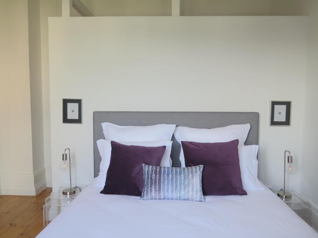 Postel nebo postele na pokoji v ubytování Penedo da Saudade Suites & Hostel