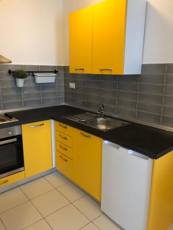 Kuchyň nebo kuchyňský kout v ubytování Apartman Lina