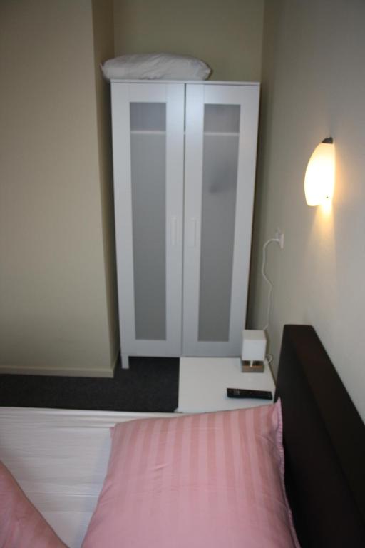 Postel nebo postele na pokoji v ubytování Hotel Café Restaurant Snackbar Beerzerveld