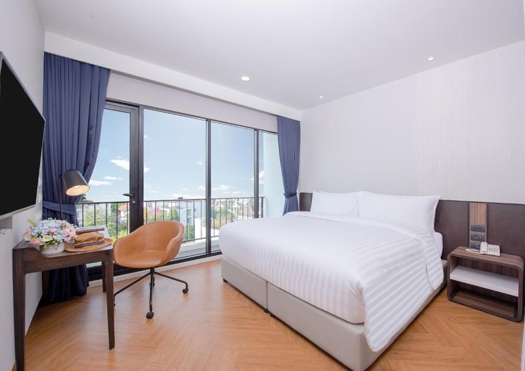 Postel nebo postele na pokoji v ubytování Amanta Hotel & Residence Sathorn