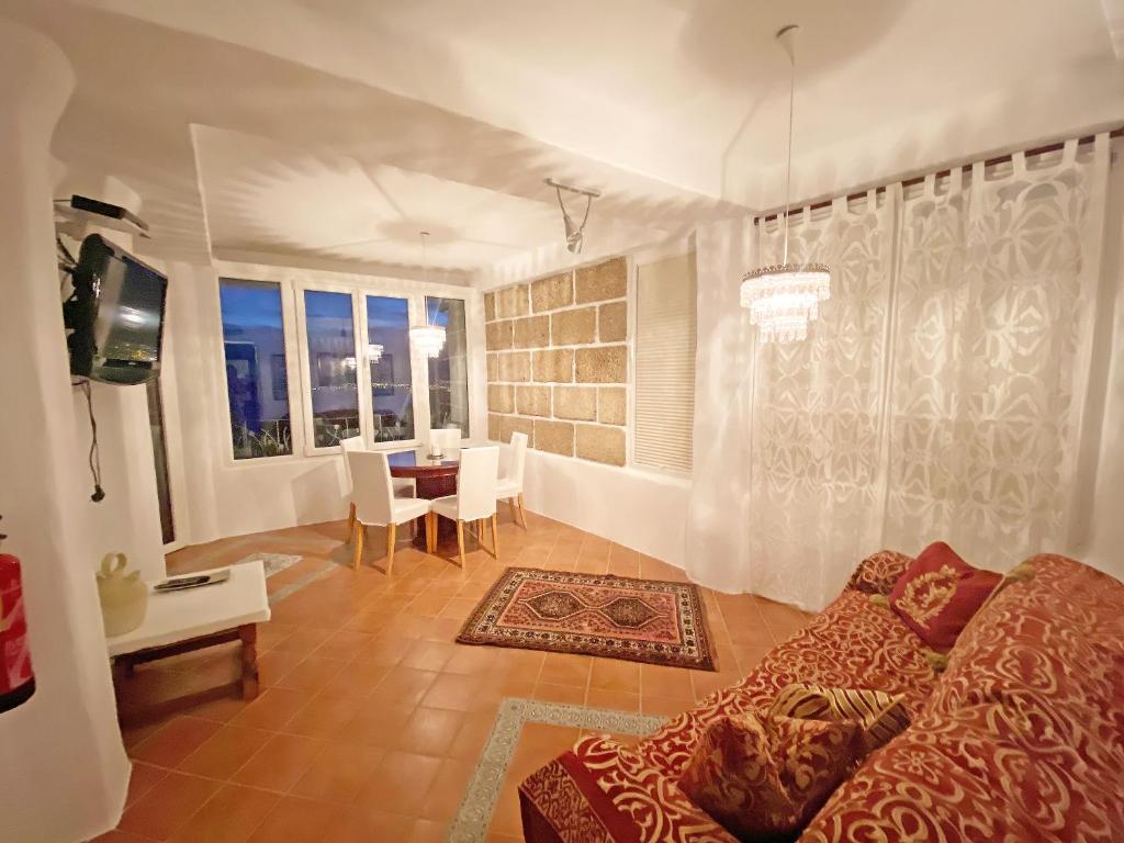 Telewizja i/lub zestaw kina domowego w obiekcie Apartamento Bella Vista