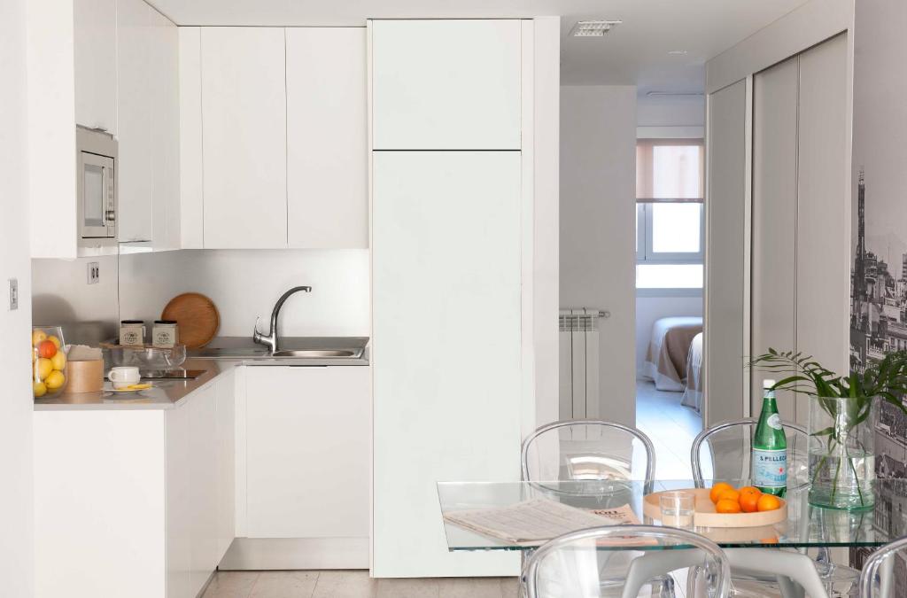 Kuchyň nebo kuchyňský kout v ubytování Eric Vökel Boutique Apartments - Atocha Suites