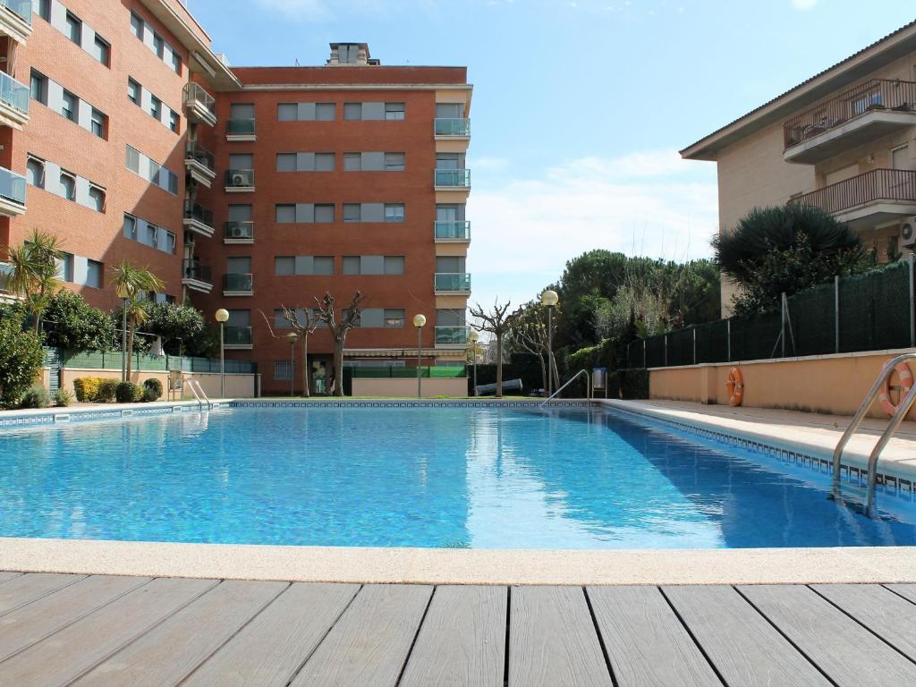 Bazén v ubytovaní Suitur beach apartment with pool alebo v jeho blízkosti