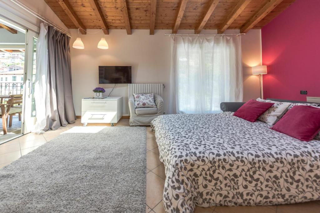 Postel nebo postele na pokoji v ubytování Residence Perlago