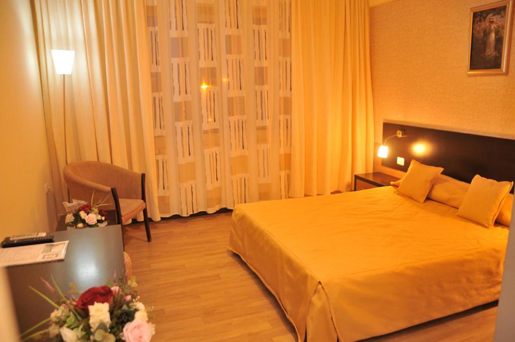 Postel nebo postele na pokoji v ubytování Hotel Nord