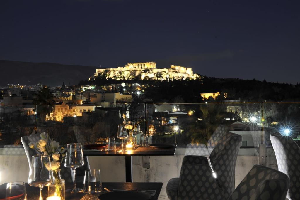 a view from the balcony of a restaurant at Athenaeum Eridanus Luxury Hotel in Athens