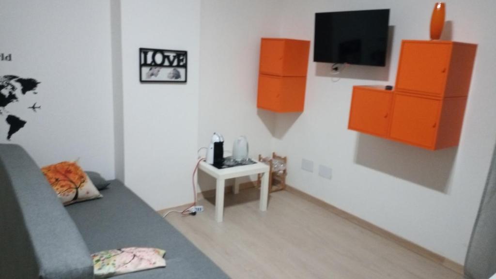 Televízia a/alebo spoločenská miestnosť v ubytovaní Giordiehouse 1