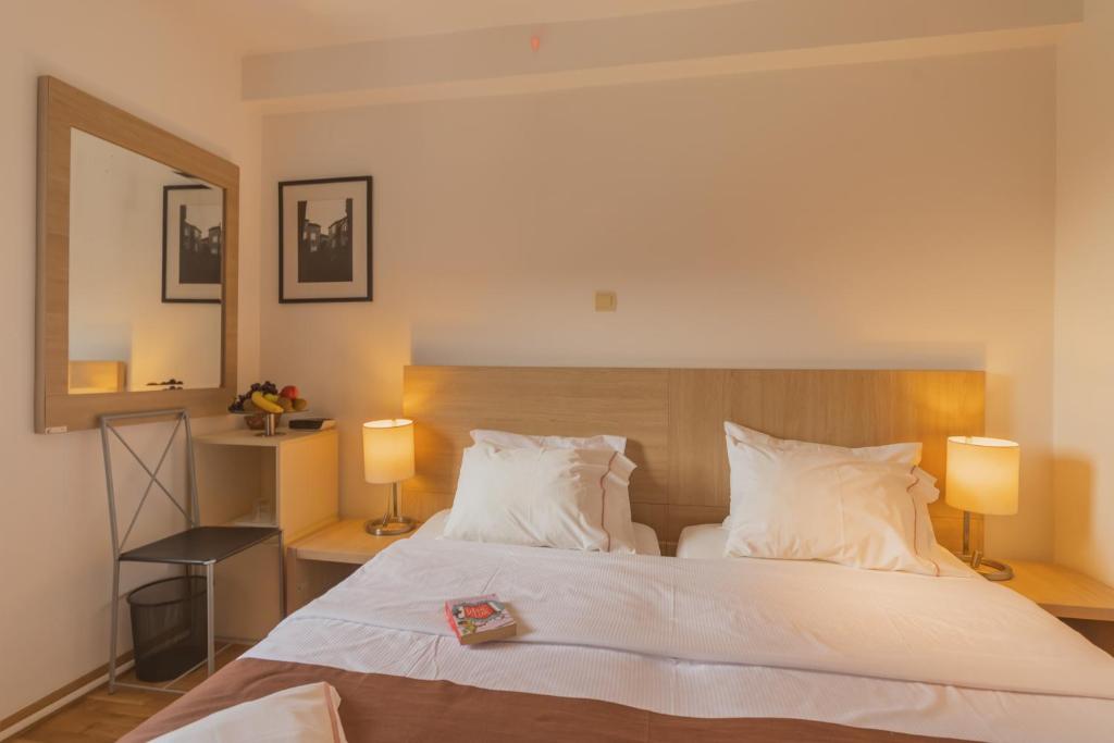 Postel nebo postele na pokoji v ubytování MonteBay villa