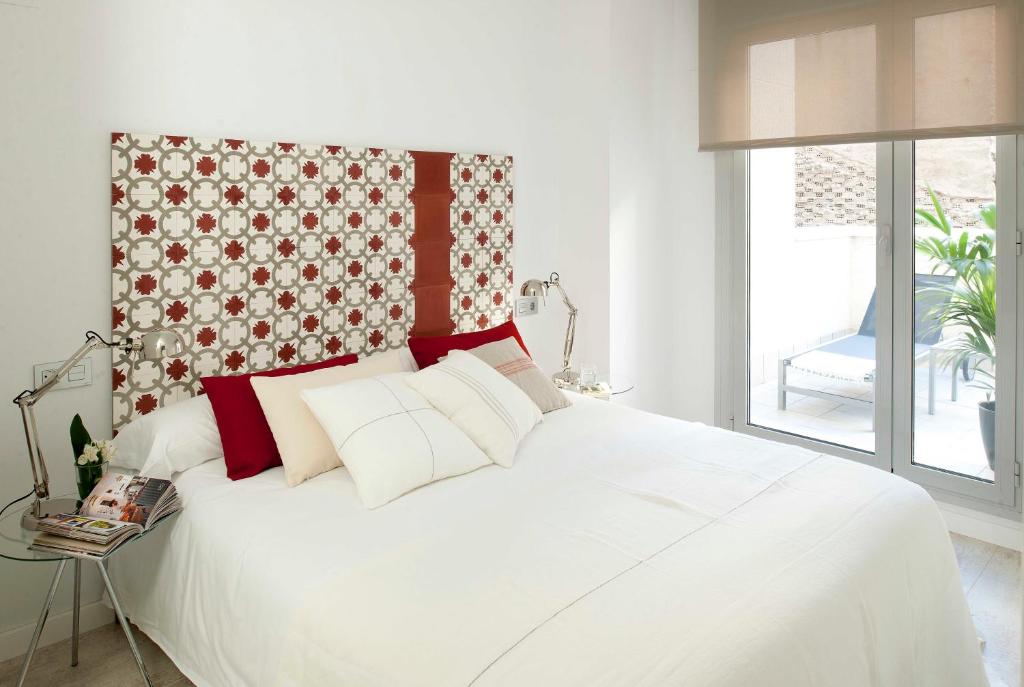 Postel nebo postele na pokoji v ubytování Eric Vökel Boutique Apartments - Atocha Suites