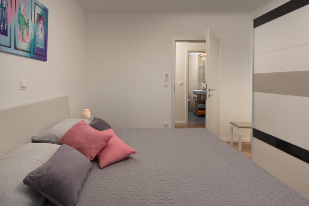 Posteľ alebo postele v izbe v ubytovaní Apartment AleMar