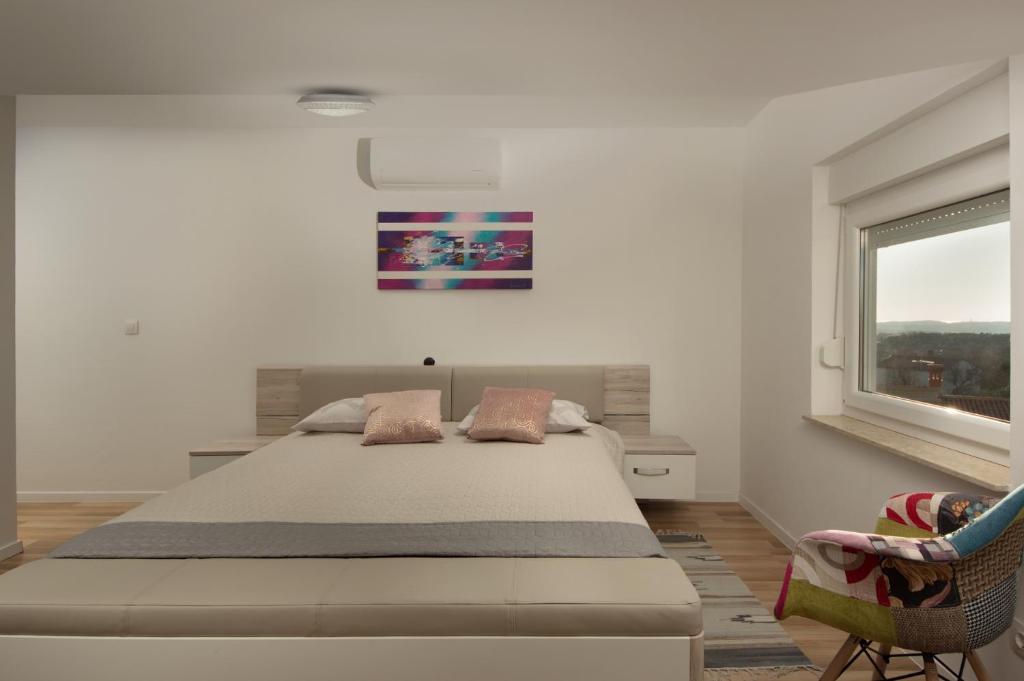 Posteľ alebo postele v izbe v ubytovaní Apartment AleMar