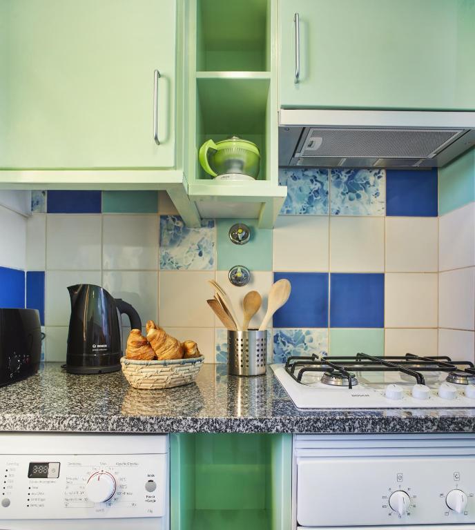 Cuisine ou kitchenette dans l'établissement Casas Barulho Albufeira Marina