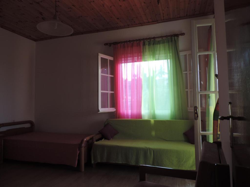 Postel nebo postele na pokoji v ubytování APARTMENTS PELI-MARIA