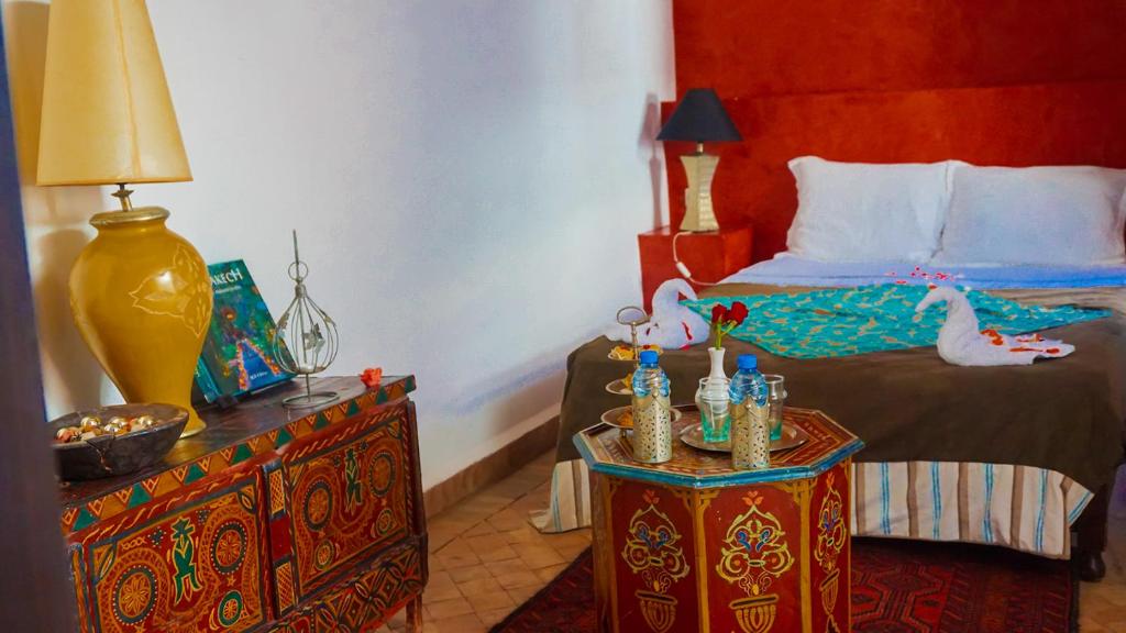 Postel nebo postele na pokoji v ubytování Riad Saba