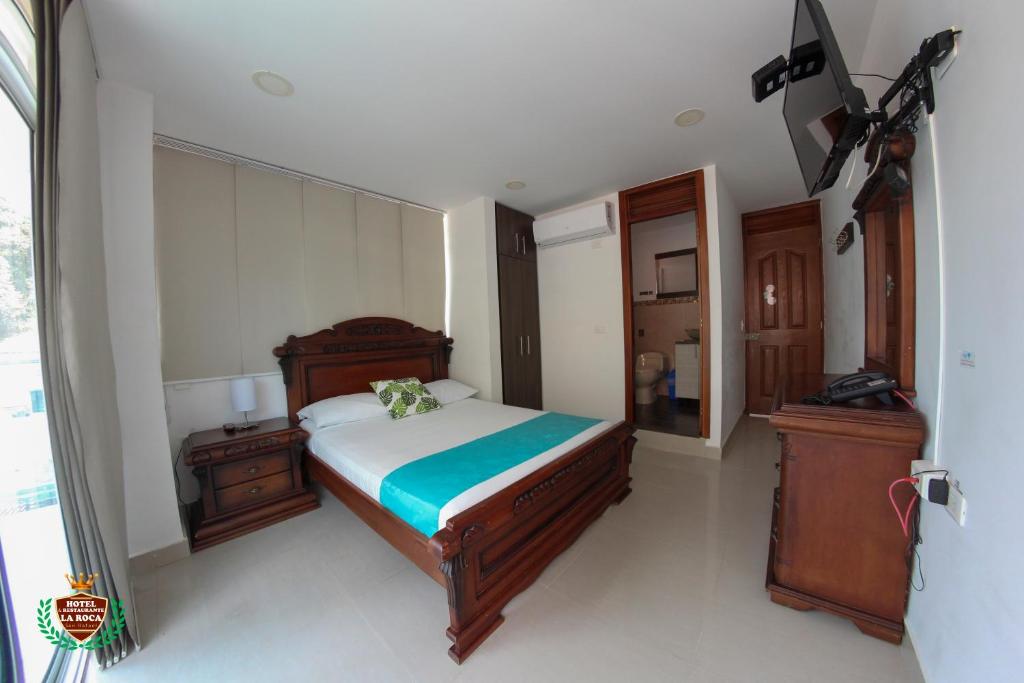 Postel nebo postele na pokoji v ubytování Hotel La Roca San Rafael
