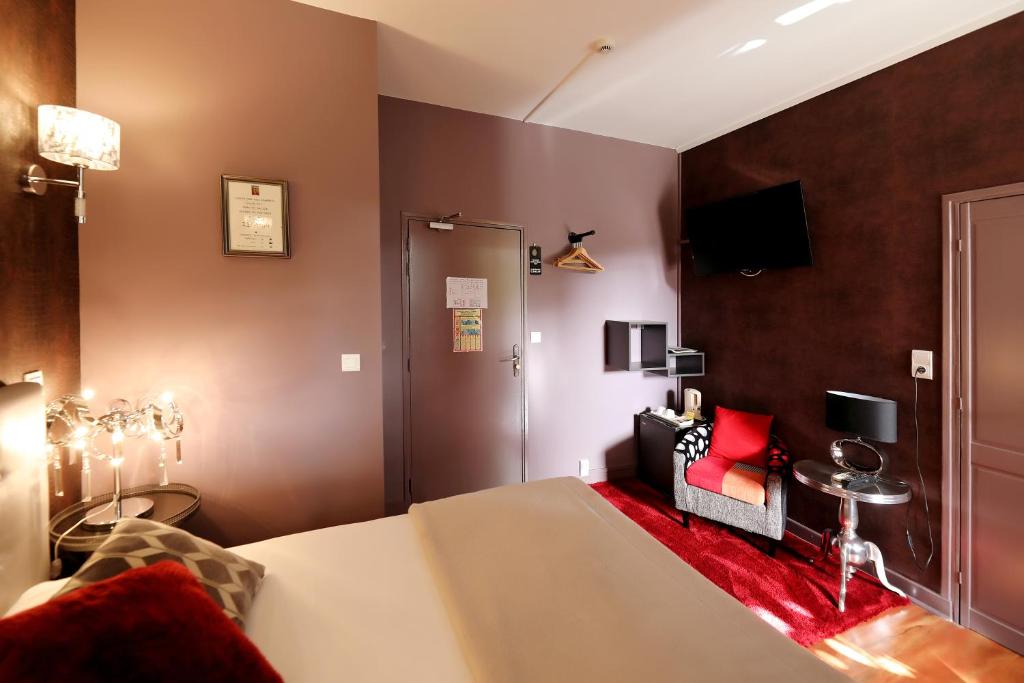 TV o dispositivi per l'intrattenimento presso Hotel Les Pasteliers