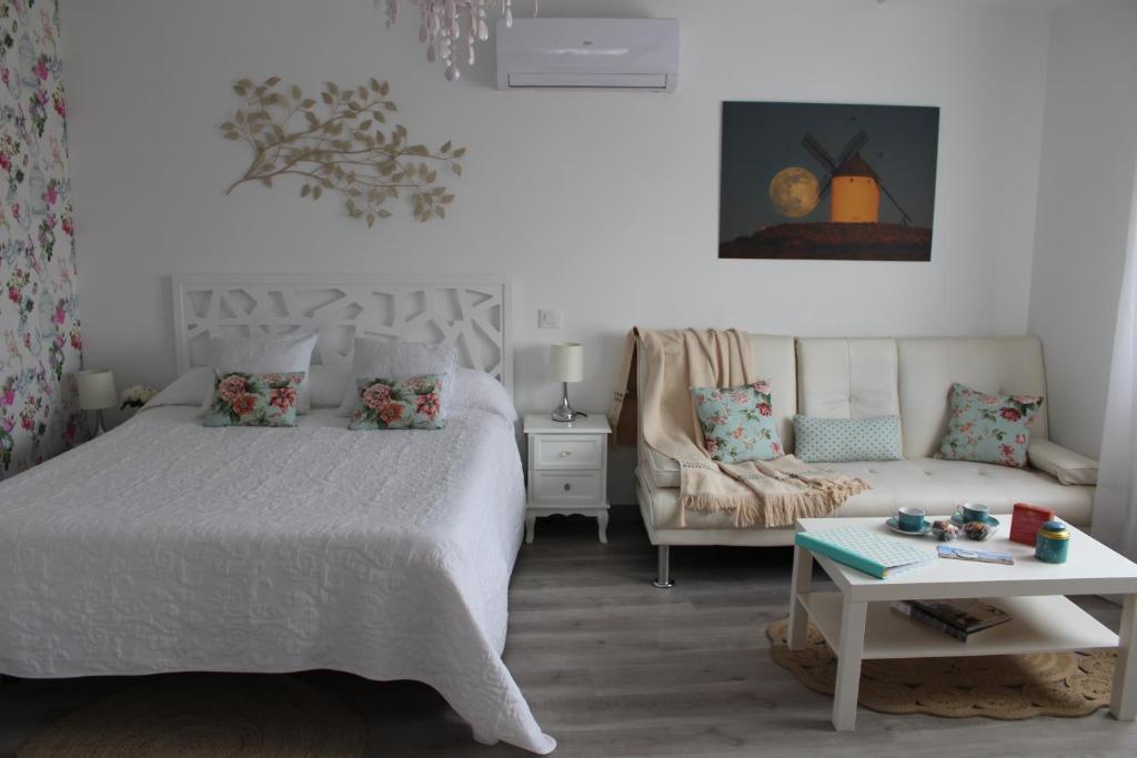 Cama o camas de una habitación en Apartamentos Oncemolinos con desayuno