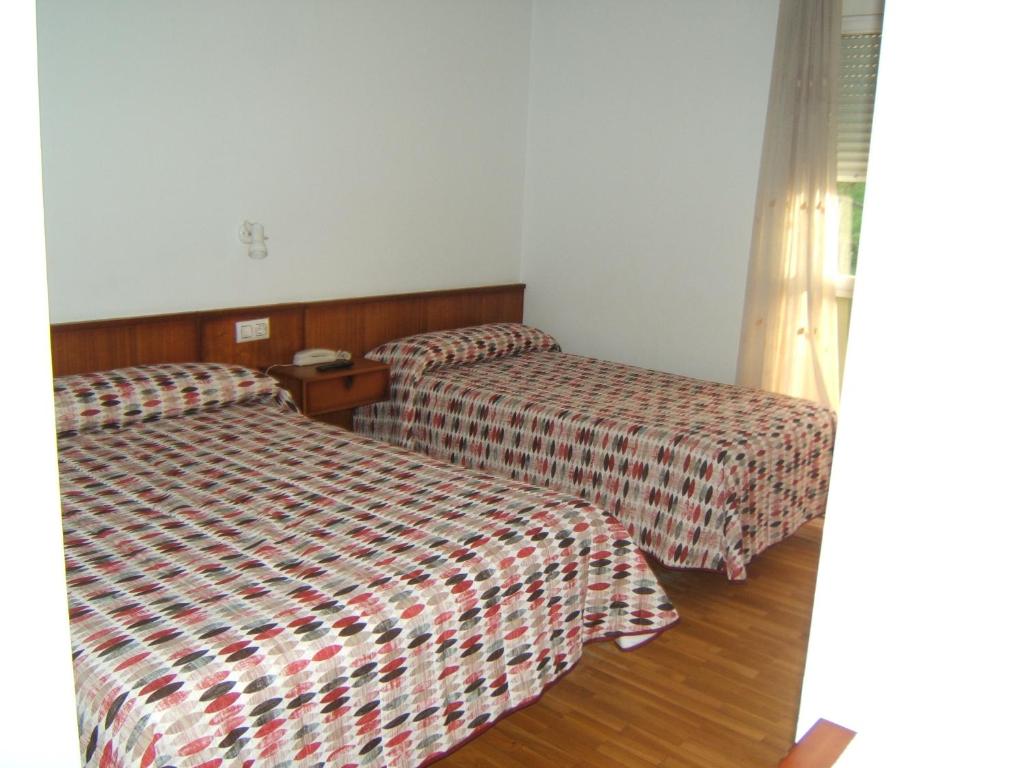 
Cama o camas de una habitación en Hotel Severino
