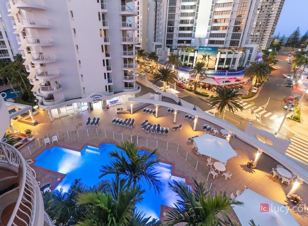 an overhead view of a swimming pool in a city at Broadbeach Holiday Apartments in Gold Coast