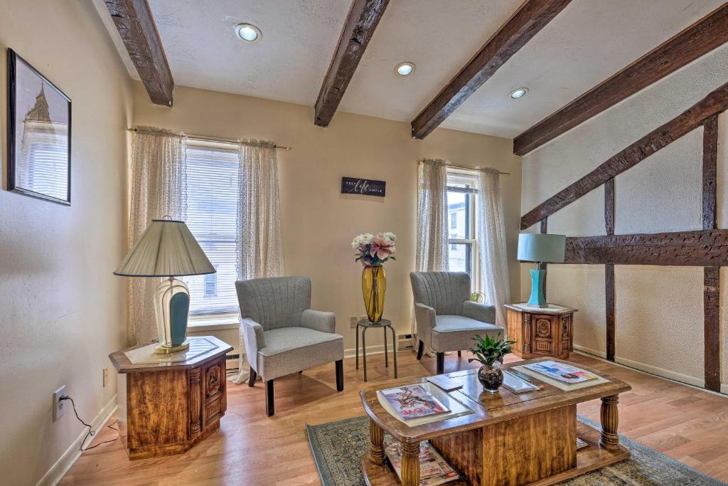 a living room with a table and two chairs at Central Albany Apartment Walk to State Capitol! in Albany