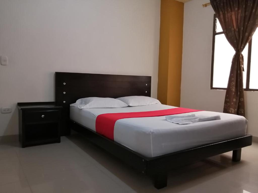 Postel nebo postele na pokoji v ubytování Hotel Portal Dorado